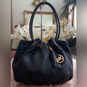 Michael Kors Medium East West Ring Tote in black leather with gold-tone hardware